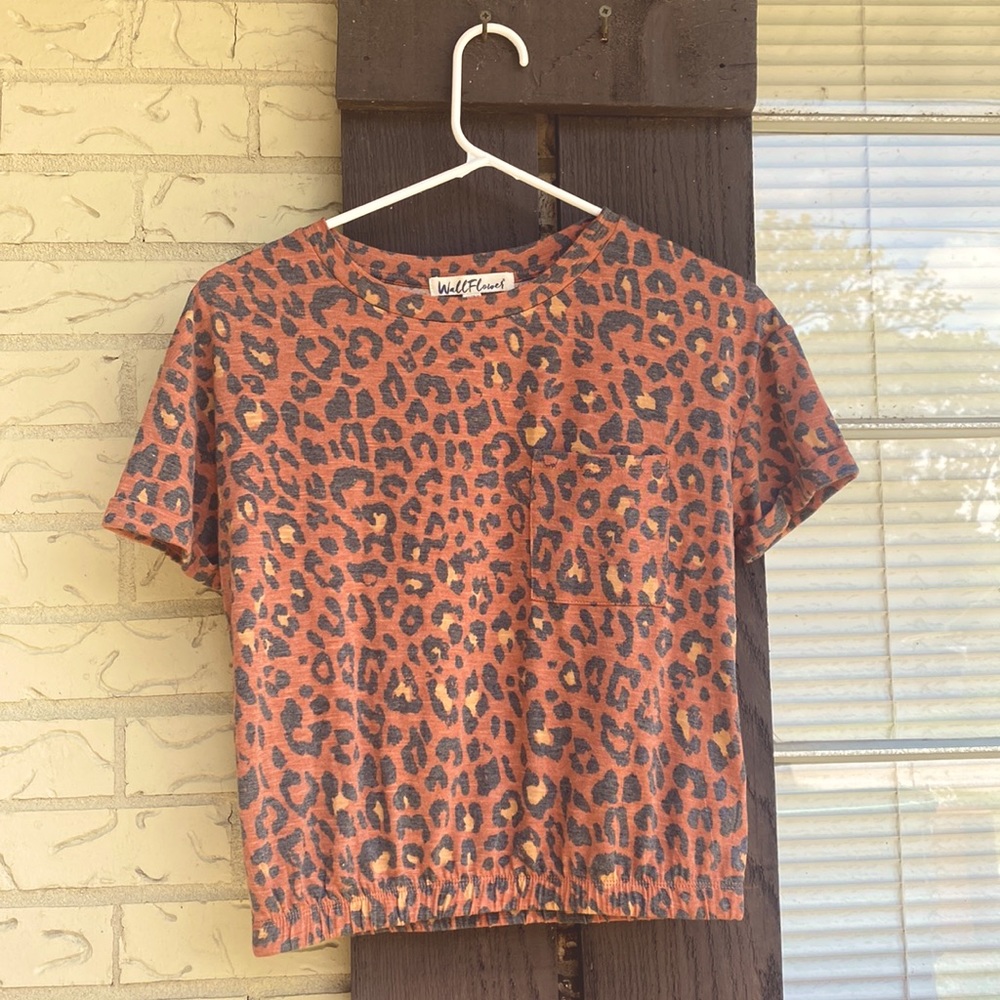 WallFlower size small top. Mid length with chest pocket and elastic band.